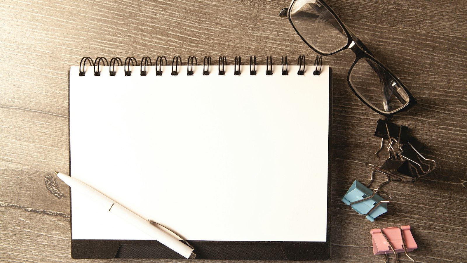 Desk with a notepad and pen